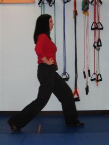 Lower your body as you thrust your pelvis towards your front heel.