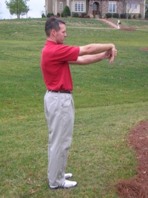 Keeping your elbow straight, bend your wrist down with your other hand until you feel a stretch. Keeping your elbow straight, bend your wrist down with your other hand until you feel a stretch.